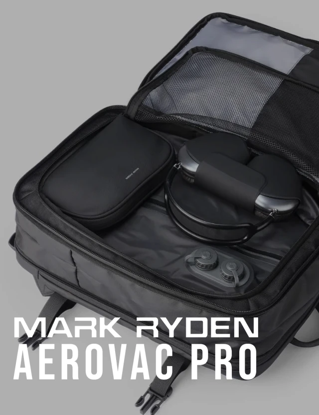 Mark Ryden Aerovac Pro Black open inside a backpack, product name overlay